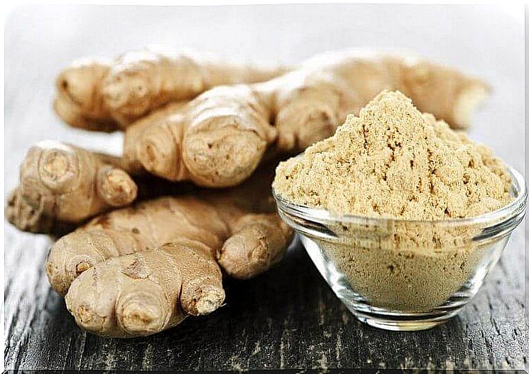 Ginger and ground ginger in glass container