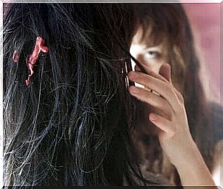 A woman with chewing gum in her hair