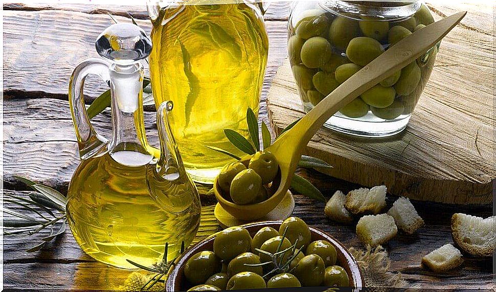 Olive oil and bowl of olives