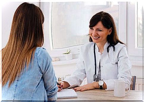 Woman in consultation with doctor