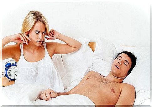 Snoring man and frustrated woman