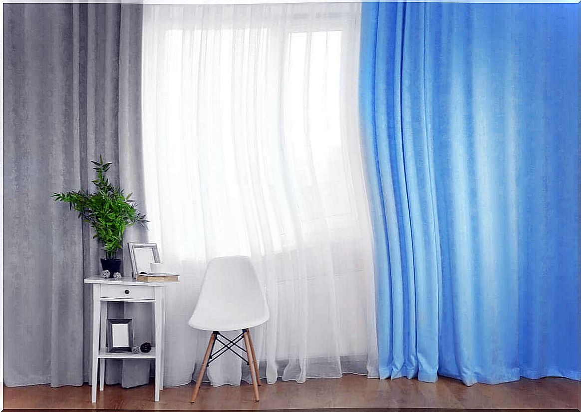 Room with 3 colors of curtains