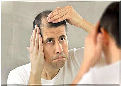 A man watches the thinning hairline