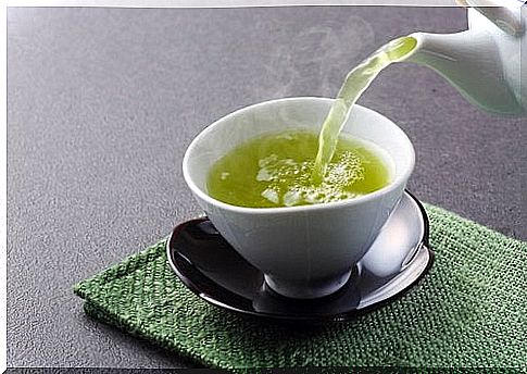 A cup of green Green tea is one of the foods that are good for the liver