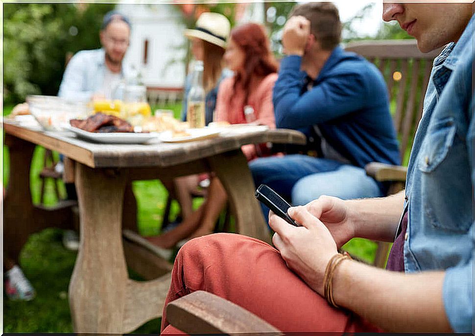 Man with smartphone who isolates himself