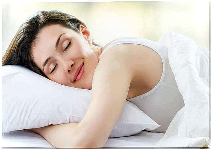 Woman creates comfortable environment for better sleep