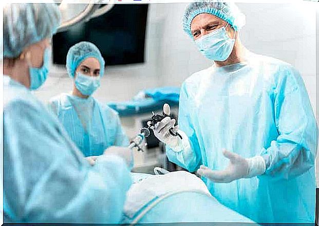 Doctors perform surgery